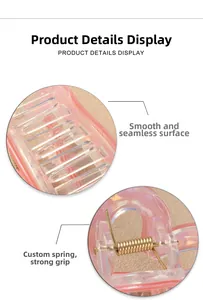 Détail de la pince à cheveux rose translucide montrant la surface lisse et le ressort doré