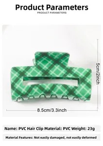 Macro detail of the 8.5x5cm green plaid PVC hair claw clip showing exact dimensions