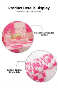 Detail of pink and white checkered hair claw clip showing smooth surface and strong gold spring