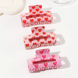 Lot de 3 pinces à cheveux carrées avec motifs de cœurs roses et rouges sur fond blanc