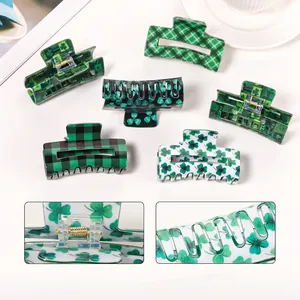 Green St. Patrick's Day hair claw clips with shamrock patterns and square checkered design