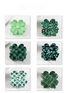 Six different patterns of green clover hair claw clips for St. Patrick's Day styling