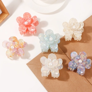 Set of six colorful floral hair claws with marble texture and elegant pearl center