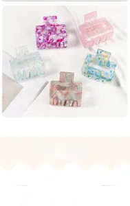 Detailed set of five stylish square hair claw clips with various trendy marble and floral patterns