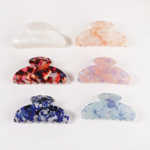 Large claw clips for thick hair set with various marble and floral acetate patterns