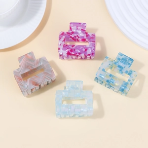 Set of four minimalist square hair claws in marble and checkered patterns for women