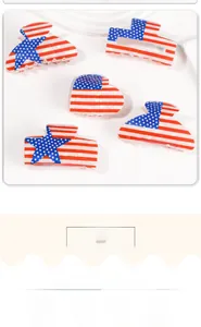 Detail of PVC hair claws featuring American flag stars and stripes with marble texture