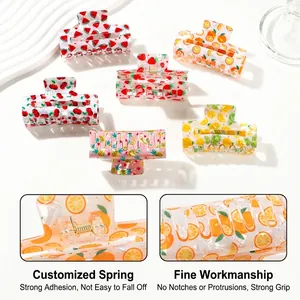 Set of 6 fruit-themed acrylic hair claws featuring watermelon and strawberry designs