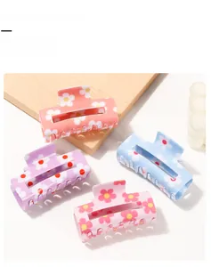 Détails des pinces à cheveux marguerite en corail, rose clair, violet et bleu ciel