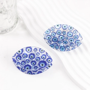 Blue evil eye hair claw clip made of premium acetate fibers with a French style aesthetic