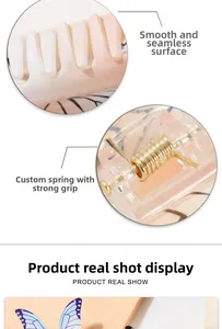 Detail of smooth butterfly hair claw teeth and golden spring mechanism construction