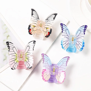 Elegant butterfly hair claw clips in assorted colors for stylish updos and hair styling