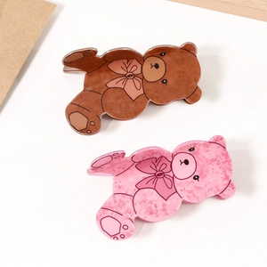 Pinze per capelli a forma di orso rosa e marrone con trama marmorea e fiocco