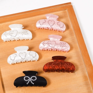Elegant 6-piece hair claw clip set with pearls and rhinestones in various colors