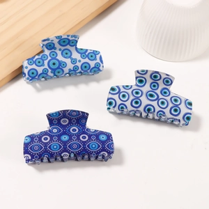 Blue Evil Eye hair claw clip set made of acetate with rectangle geometric patterns