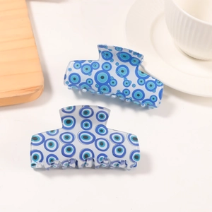 Blue and white Evil Eye claw clip set made of acetate resin for elegant hairstyling