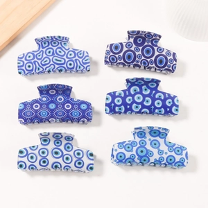 Set of 6 blue Evil Eye hair claws in rectangular design with various marble patterns
