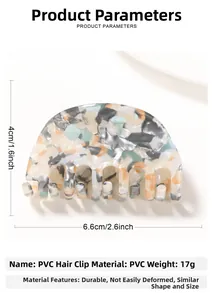 Vue détaillée d'une pince à cheveux de 6,6 cm x 4 cm avec motif marbré coloré en PVC