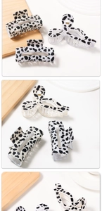 Three-piece set of black and white cow print hair claws in rectangular and floral shapes