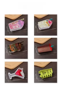 Detail view of colorful ice cream and cocktail cup hair claws with size measurements