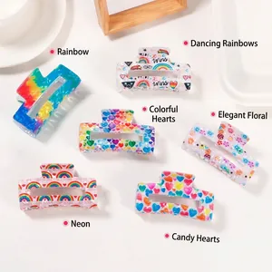 Rainbow PVC rectangular claw clips featuring Pride and heart patterns in six diverse styles