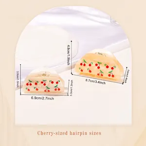 Elegant cherry print hair claw clips in large and small sizes with resin finish