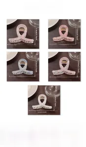 Detailed size chart for cellulose acetate hair claws showing 8.4cm length and 5.4cm height