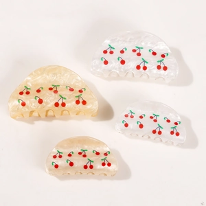 Elegant cherry acetate hair claws in pearl white and cream yellow, set of four