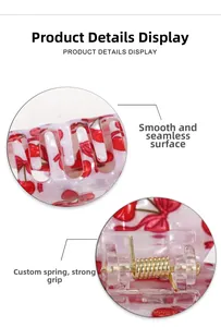 Détail de la finition lisse et du ressort métallique de la pince à cheveux à motif cerise