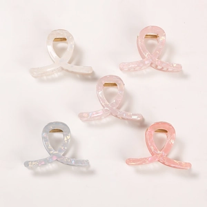 Five-piece set of iridescent pearl hair claws in assorted pastel colors for women