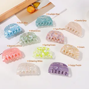 Set of 10 medium PVC semi-circle shark hair claws with colorful marble patterns