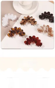 Detailed set of six stylish large petal hair claws in assorted tortoise and marble patterns