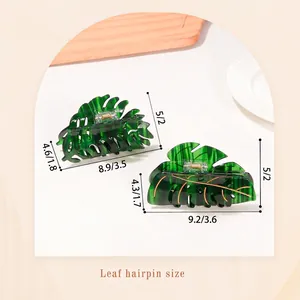 Leaf-shaped green PVC hair claw clips for women with elegant golden vein details
