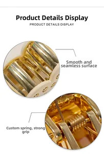 Macro detail of golden metal hair claw showing smooth polished surface and strong custom spring