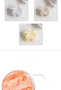Macro detail of translucent floral hair claw clips with size measurements in inches