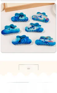 Set of 6 ocean-themed cloud-shaped hair claws featuring dolphin and shark prints