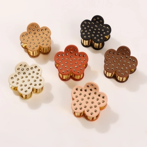 Set of 6 vintage flower hair claws in multiple colors with gold rivets and metallic base