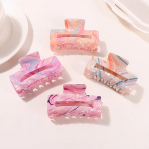 Set of four large marble pattern hair claws with elegant gradient acetate finish
