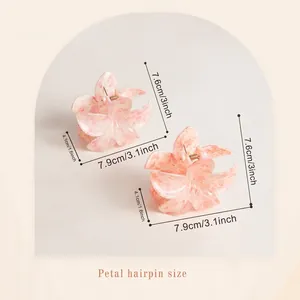 Floral frangipani hair claw clip set in dreamy pink ice crystal petal design