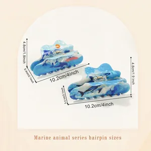 Cute ocean animal hair claw clips with blue dolphin and tropical sea landscape patterns