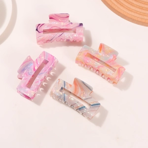 Set of four gradient marble patterned acetate hair claws in rectangle hollow design