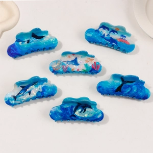 6-piece set of ocean-themed acetate hair claws featuring shark and dolphin designs