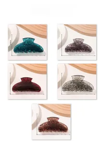 Detailed size chart and multi-color display of marble pattern acrylic hair claws