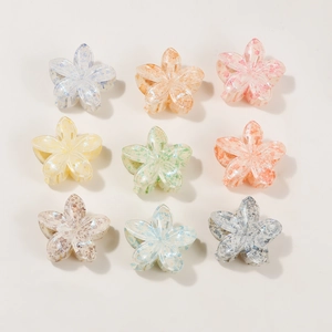Set of 9 crystal flower hair claws in multiple soft colors with glitter finish