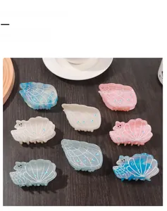 Lot de 8 pinces à cheveux nacrées en forme de coquillage avec strass bleus brillants