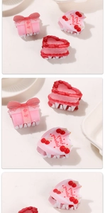 Detailansichten von Kirschkuchen und Happy Birthday Herz-Haarklammern in Pink