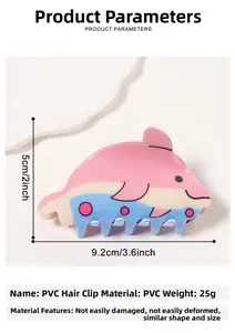 Vue détaillée de la pince à cheveux dauphin montrant la taille de 9,2 cm et le PVC