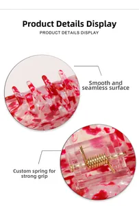 Detail view of the marble pattern hair claw clip with its durable metal spring mechanism