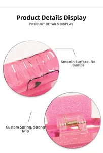 Detailed macro view of pink glitter hair claw clip with strong metal spring mechanism