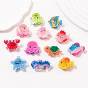 Colorful 12-piece ocean animal hair clips for kids featuring octopus turtle and starfish